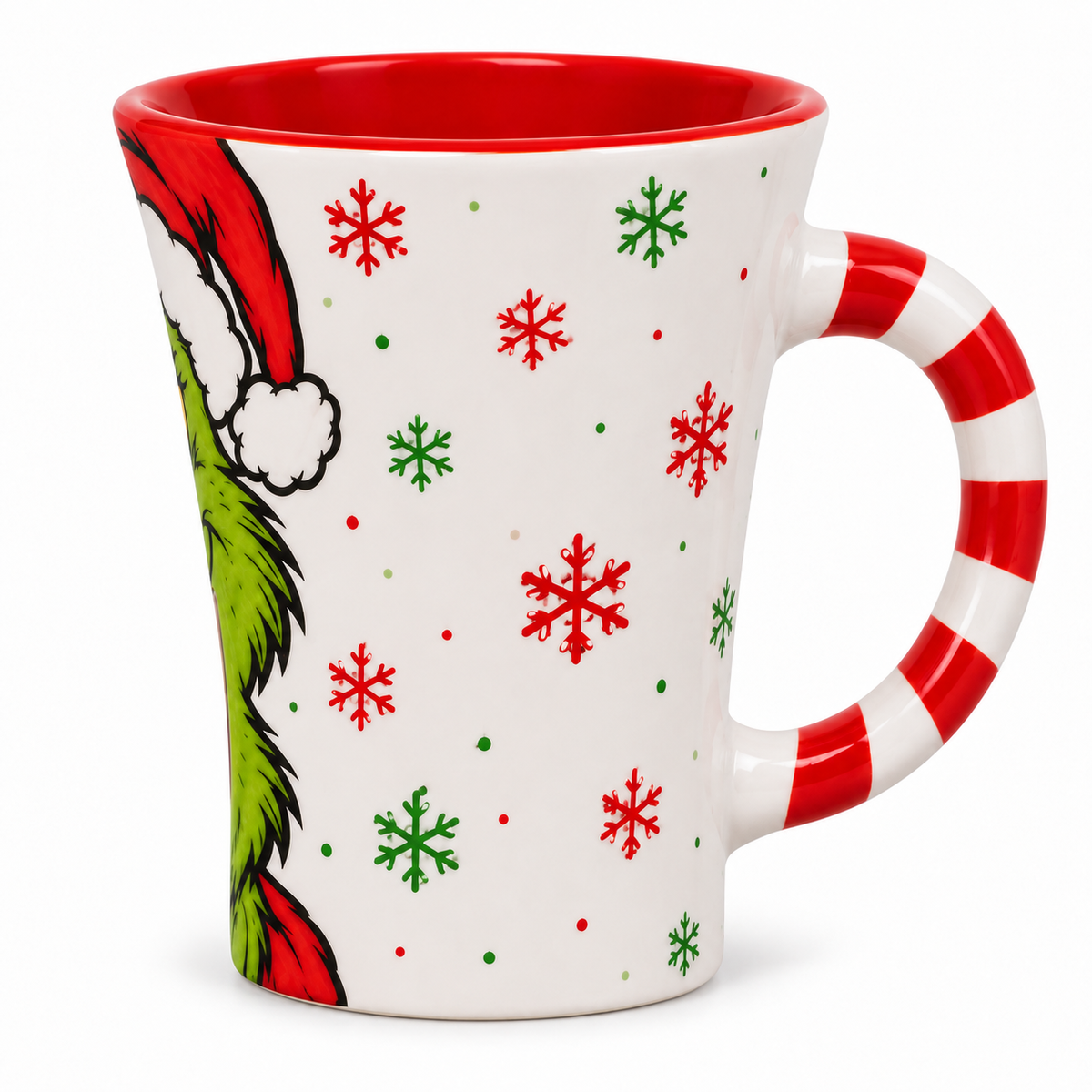 Side view of the Grinch chocolate melter mug showing the candy-cane striped handle and snowflake pattern